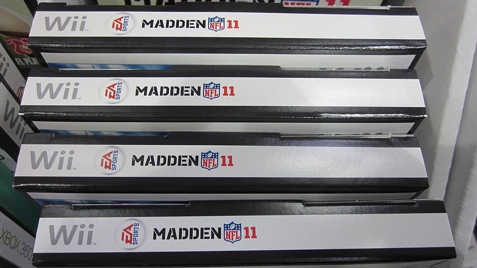 Four visible cases of Madden NFL 11 for Nintendo Wii. The discs and their condition cannot be seen.